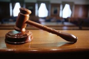 Court sentences two persons for land fraud
