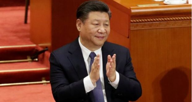 Mr Xi applauded after the amendment was passed