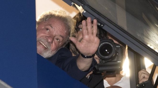 The former Brazilian president waved to supporters from the building where he is staying