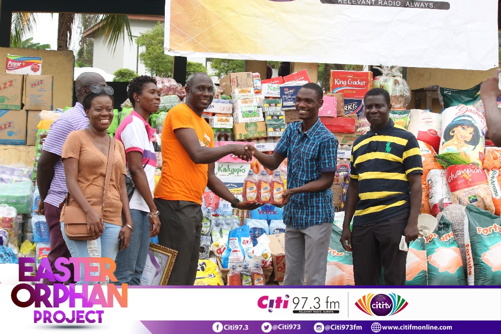 Citi FM staff donating to the orphanages as part of the Easter Orphan Project