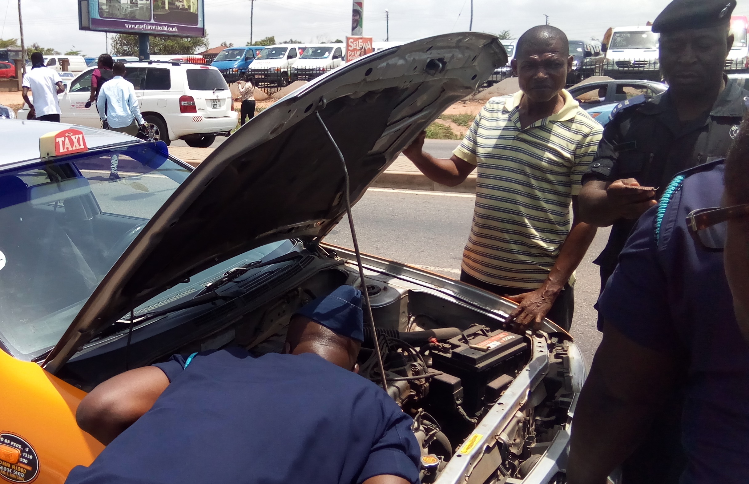 GRA officials inspecting a vehicle