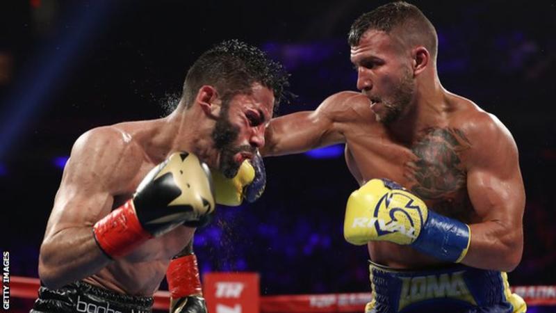 Vasyl Lomachenko, right, ended the bout with a vicious flurry in the 10th round (Image credit: Getty Images)