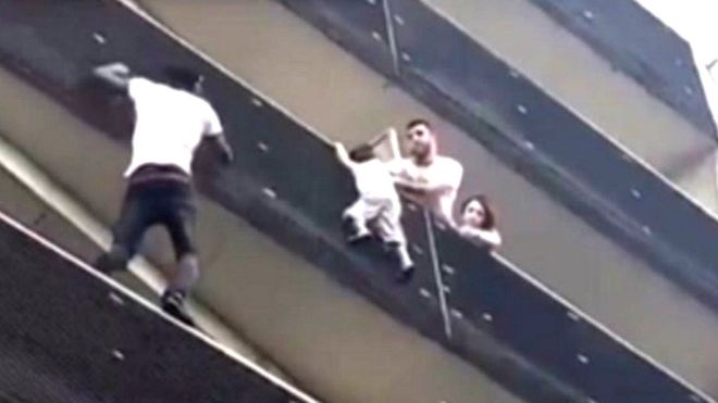 Oblivious to the danger, Mamoudou Gassama rapidly pulled himself from balcony to balcony