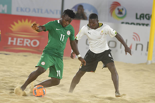 Nigeria's Suleman Mohammed (L) vies with Ghana's Kofi Aziz during the beach soccer (football) match Nigeria vs Ghana at the 2016 Beach Soccer African Cup of Nations (Image credit: Getty Images)