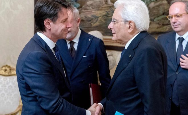 Giuseppe Conte (L) presented a new list of ministers to President Sergio Mattarella