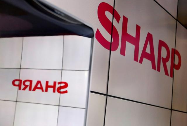 FILE PHOTO -  A logo of Sharp Corp is pictured at CEATEC (Combined Exhibition of Advanced Technologies) JAPAN 2016 at the Makuhari Messe in Chiba, Japan, October 3, 2016.   REUTERS/Toru Hanai/File Photo