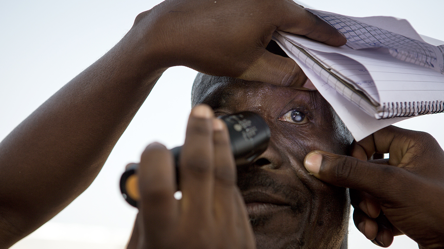 A man being checked for trachoma in Yendi (Source: Sightsavers)