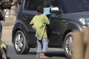 Child labour: In the matter of alms begging [Article]