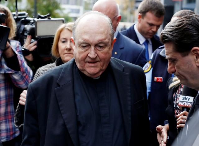 FILE PHOTO: Archbishop Philip Wilson leaves Newcastle Local Court, in Newcastle, Australia, July 3, 2018. AAP/Darren Pateman/via REUTERS