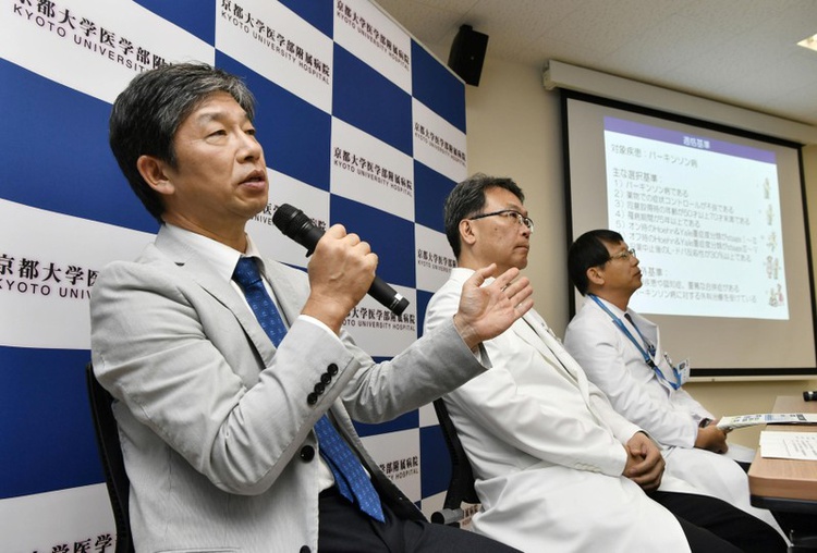 Jun Takahashi (L), professor at Kyoto University's Center for iPS Cell Research and Application, attends a news conference in Kyoto, Japan, in this photo taken by Kyodo on July 30, 2018. Mandatory credit Kyodo/via REUTERS
