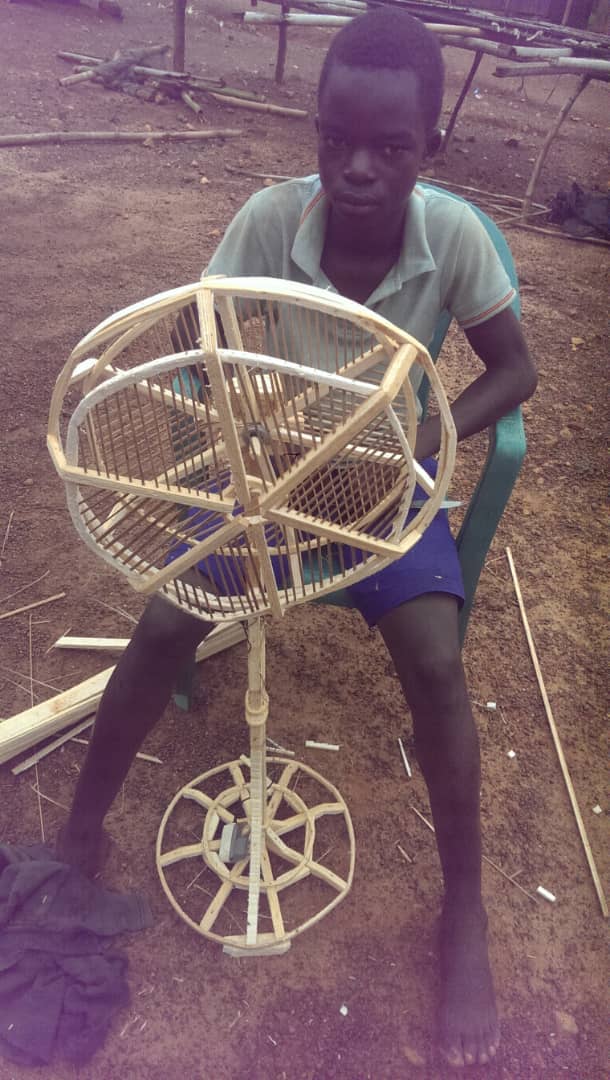 Unearthing talent 15 year old Ghanaian makes wooden standing fan 1