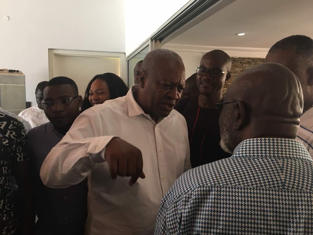 Mahama interacting with party officials at his office