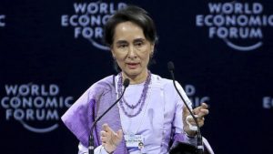 Suu Kyi defends jailing journalists
