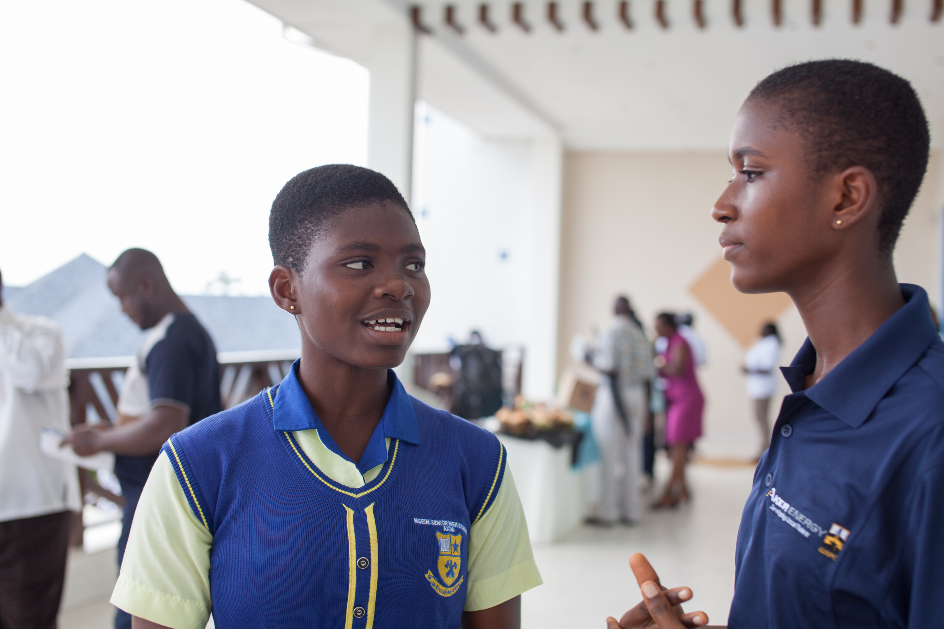 Susanne Twieky (left), a third year student at Nsein Senior High, shares her experiences under the Aker-GNPC scholars program with 2018 beneficiary student, Sandra Odoom. 