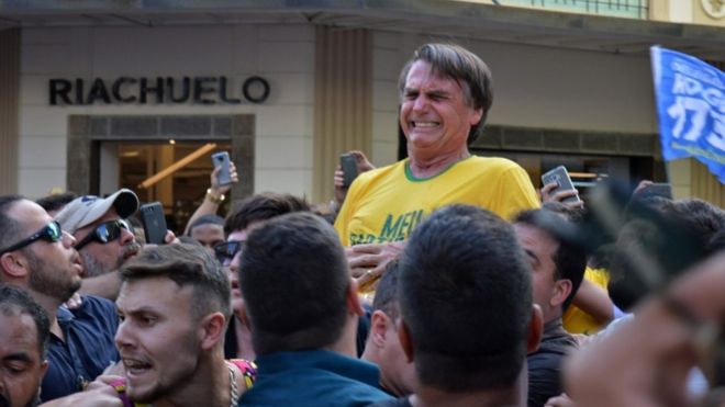 Presidential candidate Jair Bolsonaro was pictured seconds after being stabbed in the stomach