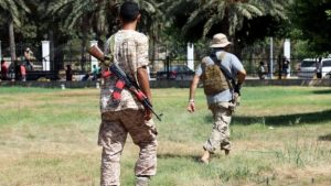 Libya violence: Gunmen storm oil corporation building
