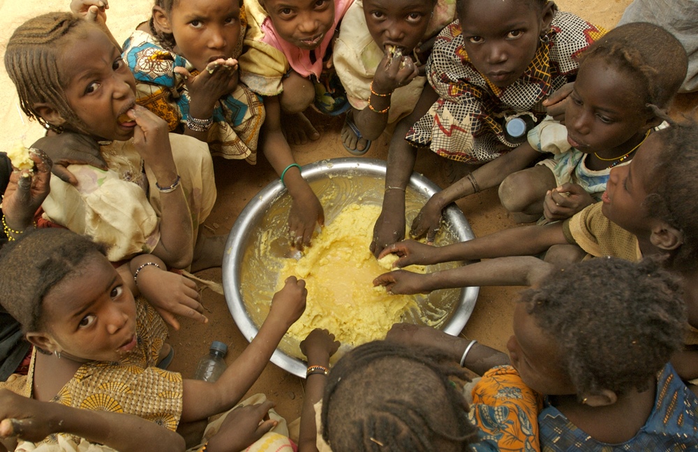 File photo: Children eating their school lunch