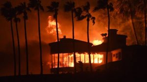 California wildfires: Malibu homes burn as death toll climbs to nine