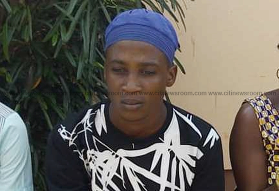 Galley Felix, the 18-year old traditional priest with his blue cap that denied him admission,