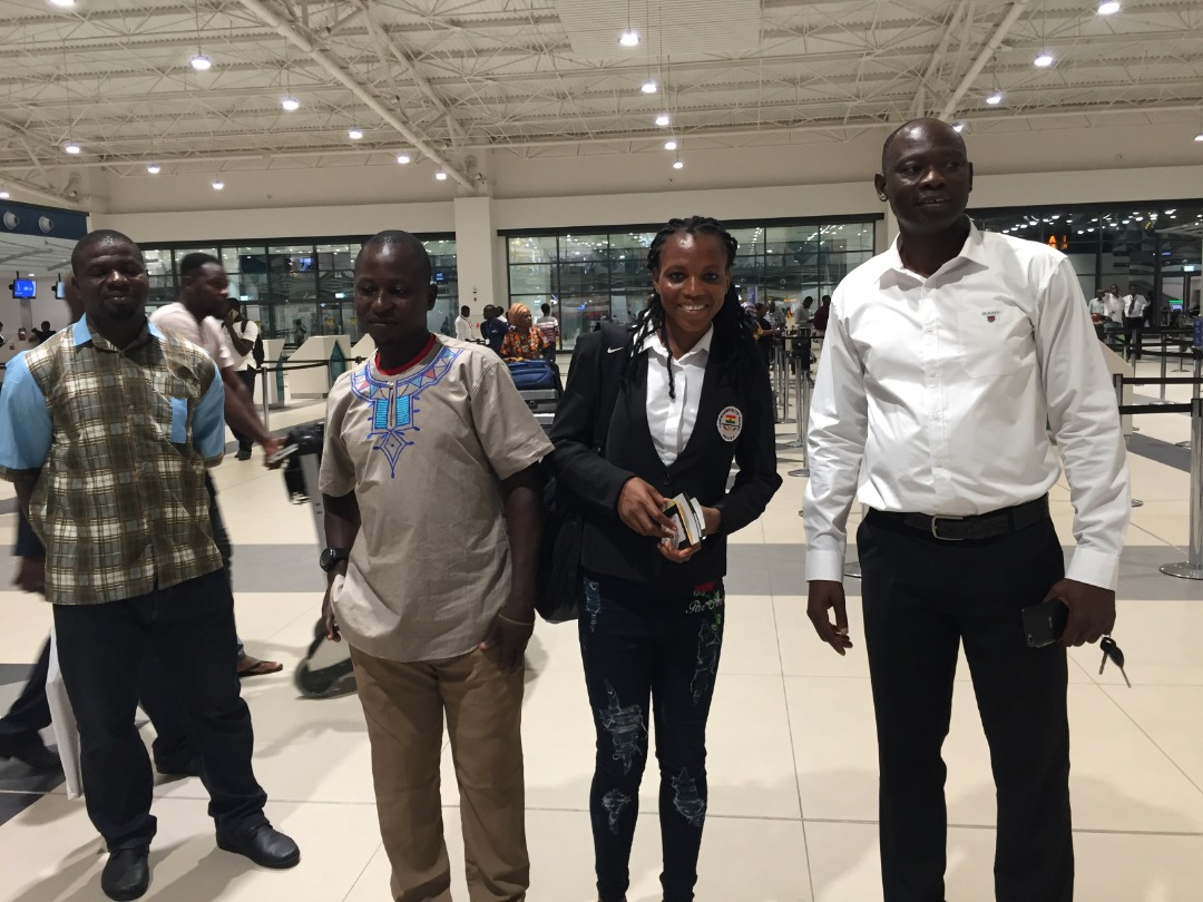 Hor (middle) is seen off at the Kotoko airport Terminal 3 with her family (left) and Bawah Fuseini (right) General Secretary, GAA)