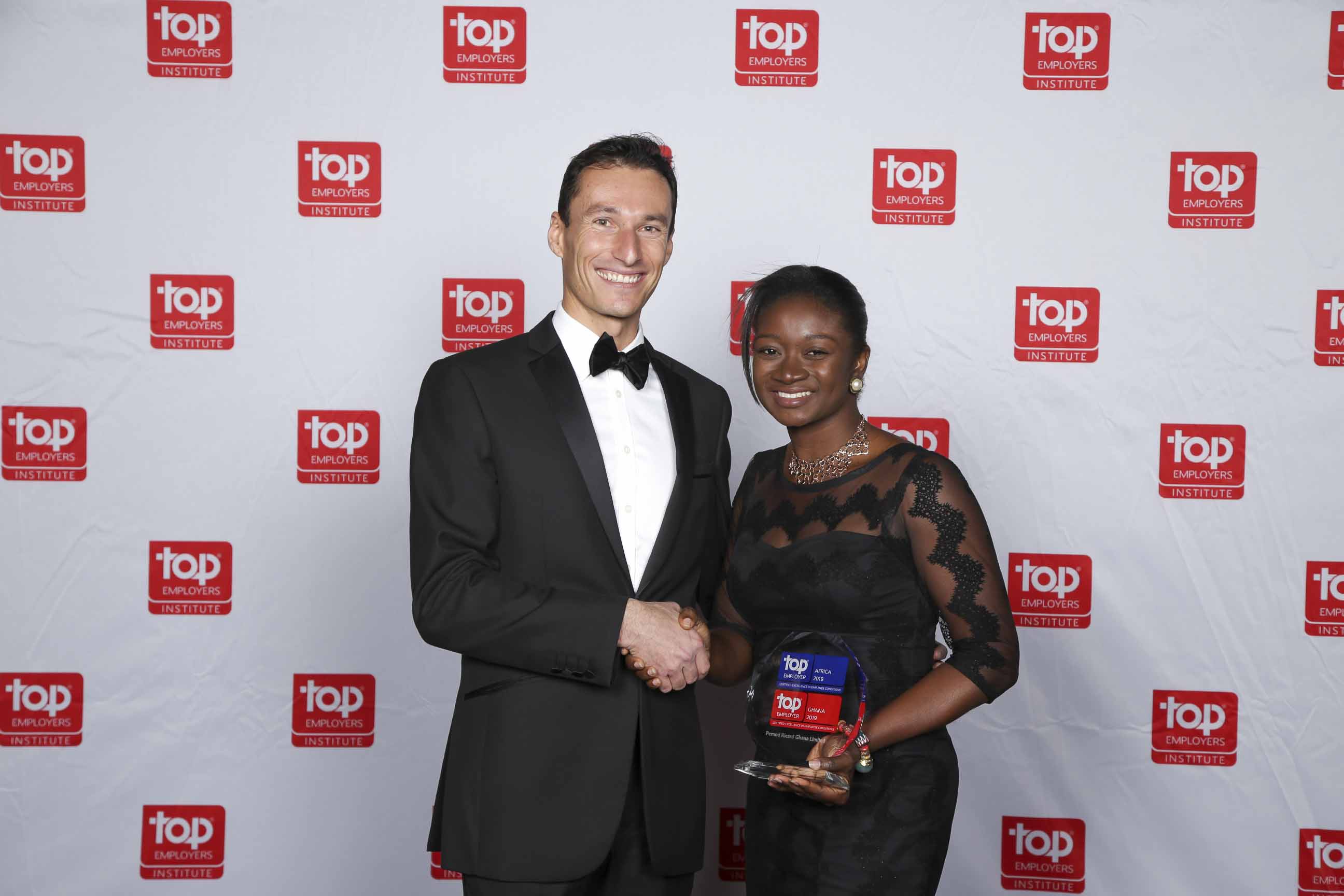 Officials of Pernod Ricard picking  up the Top Employer Award in Sub-Saharan Africa (SSA).