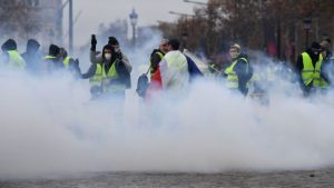 France fuel protests: Tear gas fired in clashes in Paris