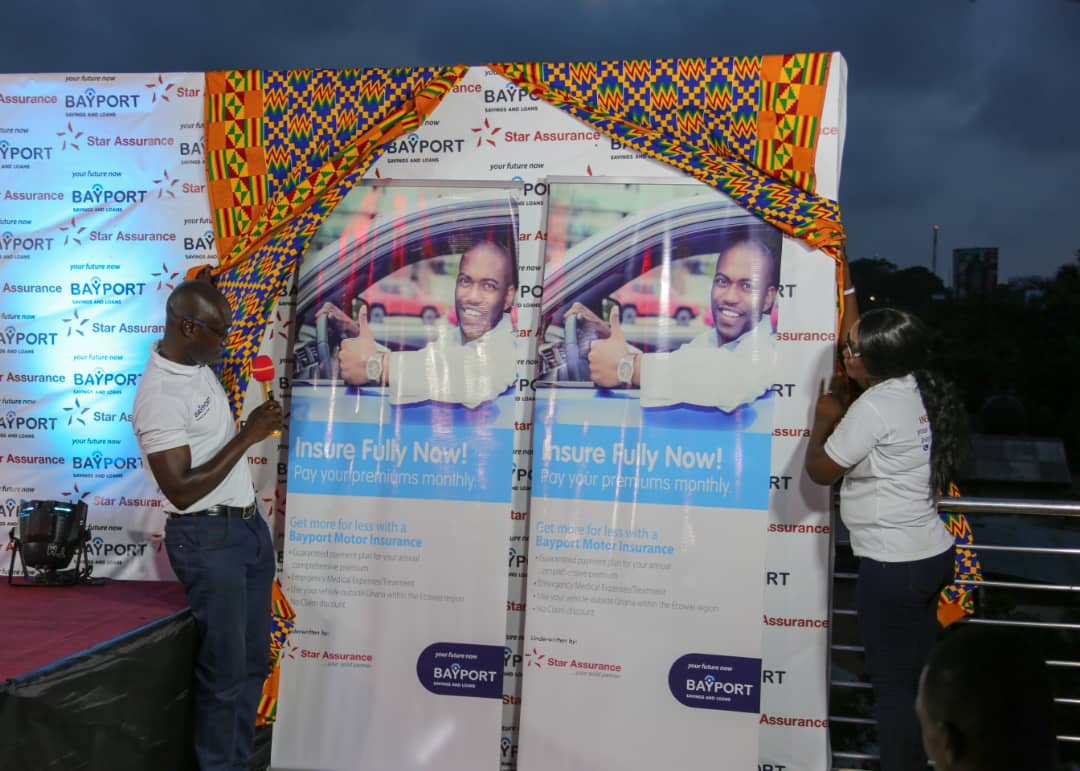 The Chief Commercial Officer at Bayport, Mr. Sam Donkor (left) with the Head of Bancassurance, Rev. Bridgette Opoku-Sarkodie unveiling the policy during the launch