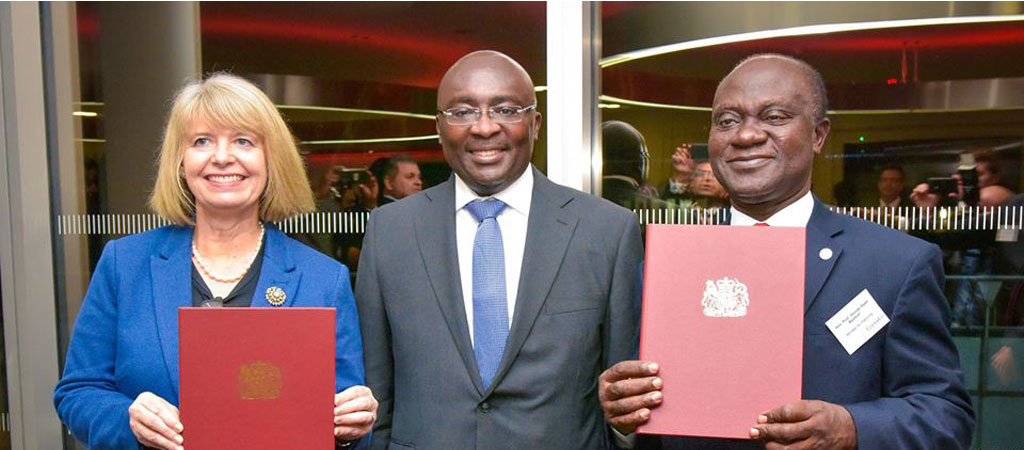 Vice President Mahamudu Bawumia (M), Mrs. Harriet Baldwin,UK’s Minister for Africa (L) and Prof. Gyan Baffour, Ghana's Minister for Planning displaying the agreement