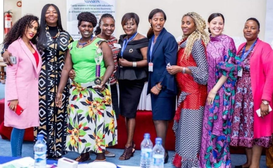 Crown Women (with Mrs Sekyere, 2nd from left) celebrate Teresia Mwangie's award at the Kenya Summit in 2018. Teresia is one of Kenya's success stories, exporting her talents to bigger markets including the United States and currently making a major difference in her community, impacting and changing lives
