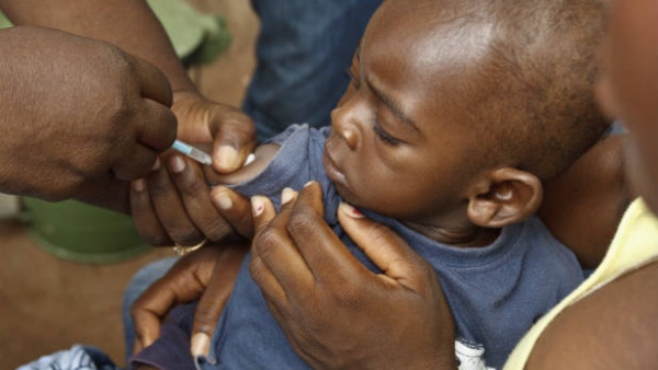 A boy is vaccinated against measles as part of a vaccination programme in Dodowa (Reuters)