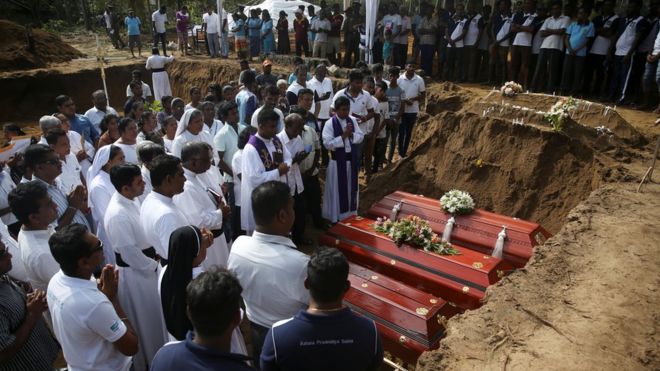 Mourners attended a funeral near St Sebastian Church in Negombo