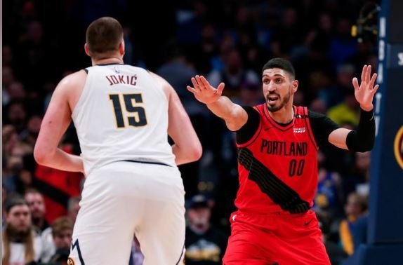 May 1, 2019; Denver, CO, USA; Portland Trail Blazers center Enes Kanter (00) defends Denver Nuggets center Nikola Jokic (15) in the second quarter in game two of the second round of the 2019 NBA Playoffs at the Pepsi Center. Mandatory Credit: Isaiah J. Downing-USA TODAY Sports/File Photo.
