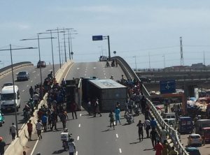 Cargo truck falls on its side on Kwame Nkrumah interchange