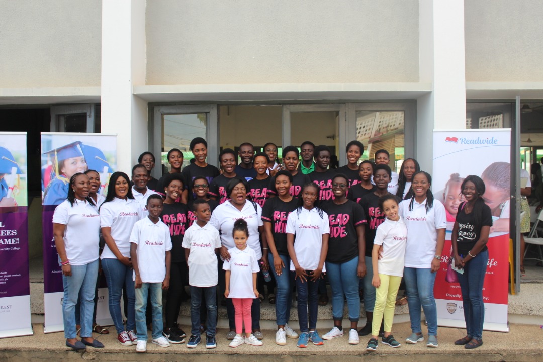 Members of Wesley Girls' Readwide Club, Junior Ambassadors and officials from Readwide Limited