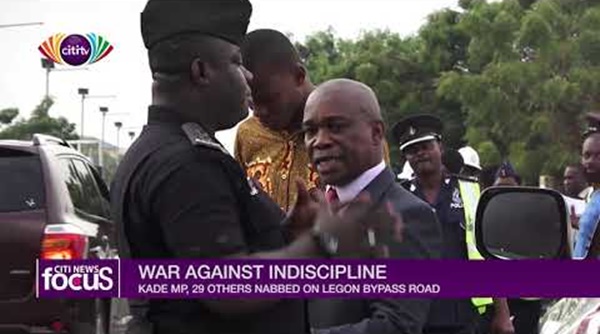 Kwabena Ohemeng-Tinyase, MP for Kade [Right] in an encounter with the police