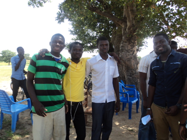 Photo: Maxwell (left) with the Ashesi volunteers who encouraged him to apply to the University.