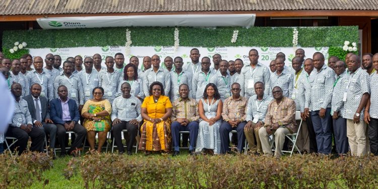 Mr. Joseph Aidoo (5th from right) and the Business head of Olam Cocoa, Mr. Eric Botwe (5th from left) join Cocoa Managers and college authorities for a picture after the interaction
