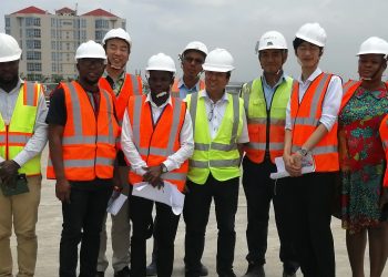 Journalists, JICA officials and some staff of Shimizu-Dai Nippon JV at the Tema Motorway Roundabout during the tour.