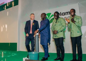 The Vice President is joined by Mr. Gerry Manley (left) Mr. Eric Botwe 2nd right and Mr. Kennedy Ntoso, Head of Sustainability, Ghana, to turn on the tap to signify the launch of a series of livelihood enhancing projects Olam has planned for various cocoa communities.