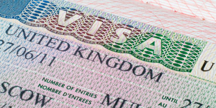 Close up United Kingdom visa in passport