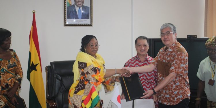 JICA's Chief Representative, Mr. Hirofumi Hoshi and Ghana's Foreign Minister at the signing ceremony.