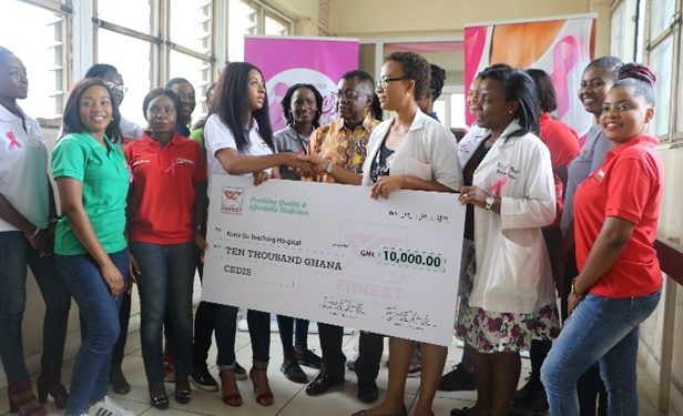 The Ernest Chemists team together with GMB contestants presenting the cheque to the Korle Bu Breast Unit