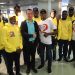 Mr. Isaac Hu with Rafatu Inusah, Tournament Manager, and Ghana Men’s VIIs Squad.