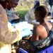 A man is given the Ebola vaccine in DR Congo