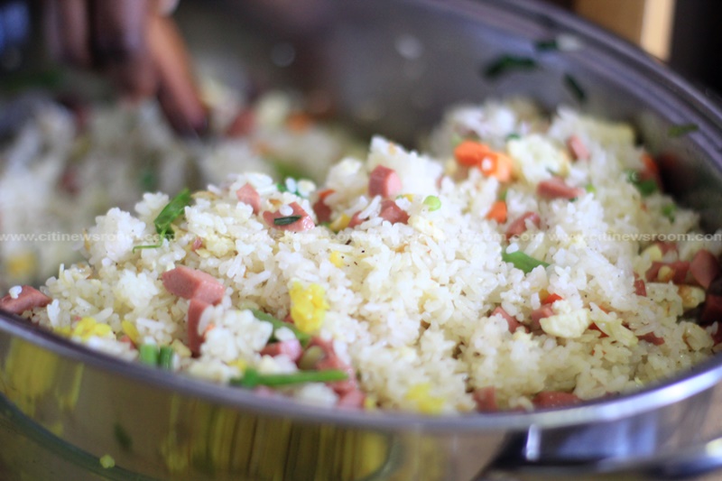 Citi FM/Citi TV staff feast on dishes made from locally produced rice