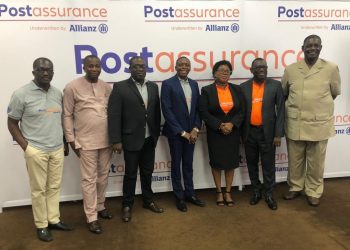 Staff of Ghana Post posing with Staff of Allianz Insurance
