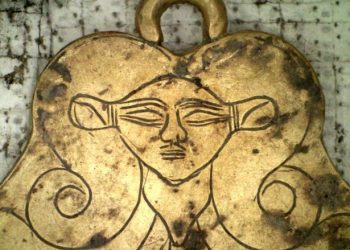 A gold pendant depicted the head of the Egyptian goddess Hathor - a protector of the dead