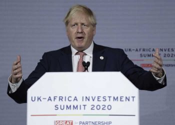 British Prime Minister Boris Johnson delivers a speech during the Opening Plenary session of the UK Africa Investment Summit in London, Monday, Jan. 20, 2020. Johnson is hosting African leaders, businesses and international institutions at the one-day summit in London. The event is taking place as Britain prepares for post-Brexit negotiations with countries around the world. (AP Photo/Matt Dunham, Pool)