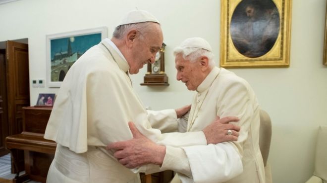 Pope Benedict (R), who retired in 2013, said he could not remain silent on the issue of priestly celibacy