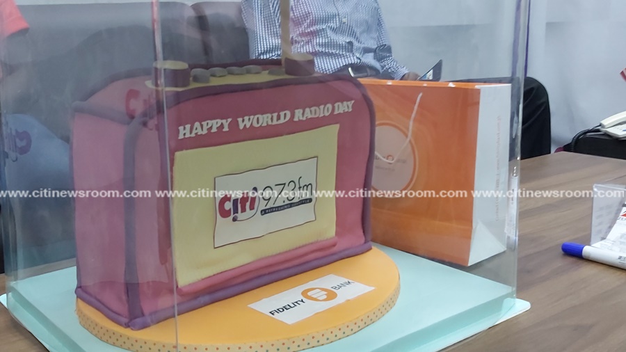 Fidelity Bank presents cake to Citi FM in celebrating World Radio Day